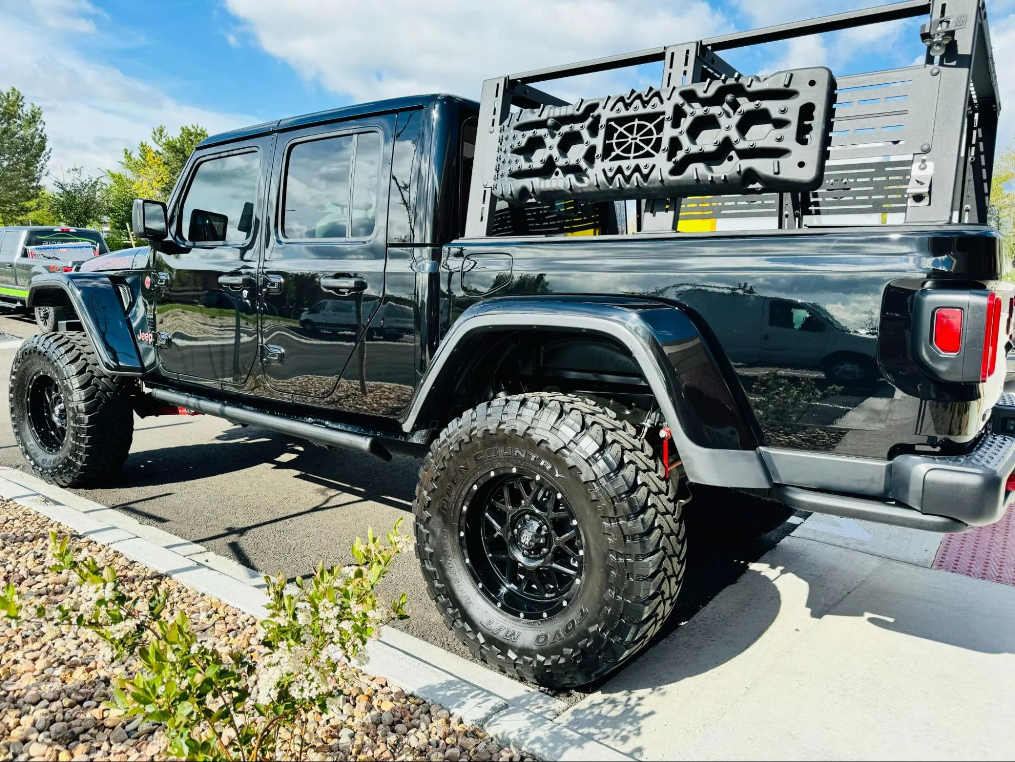 A black Jeep Gladiator Rubicon outside Ride N' Shine in Arvada